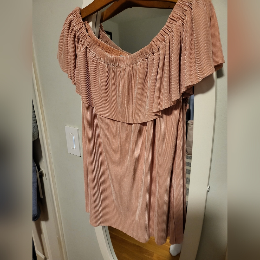 Peach colored off the shoulder top.